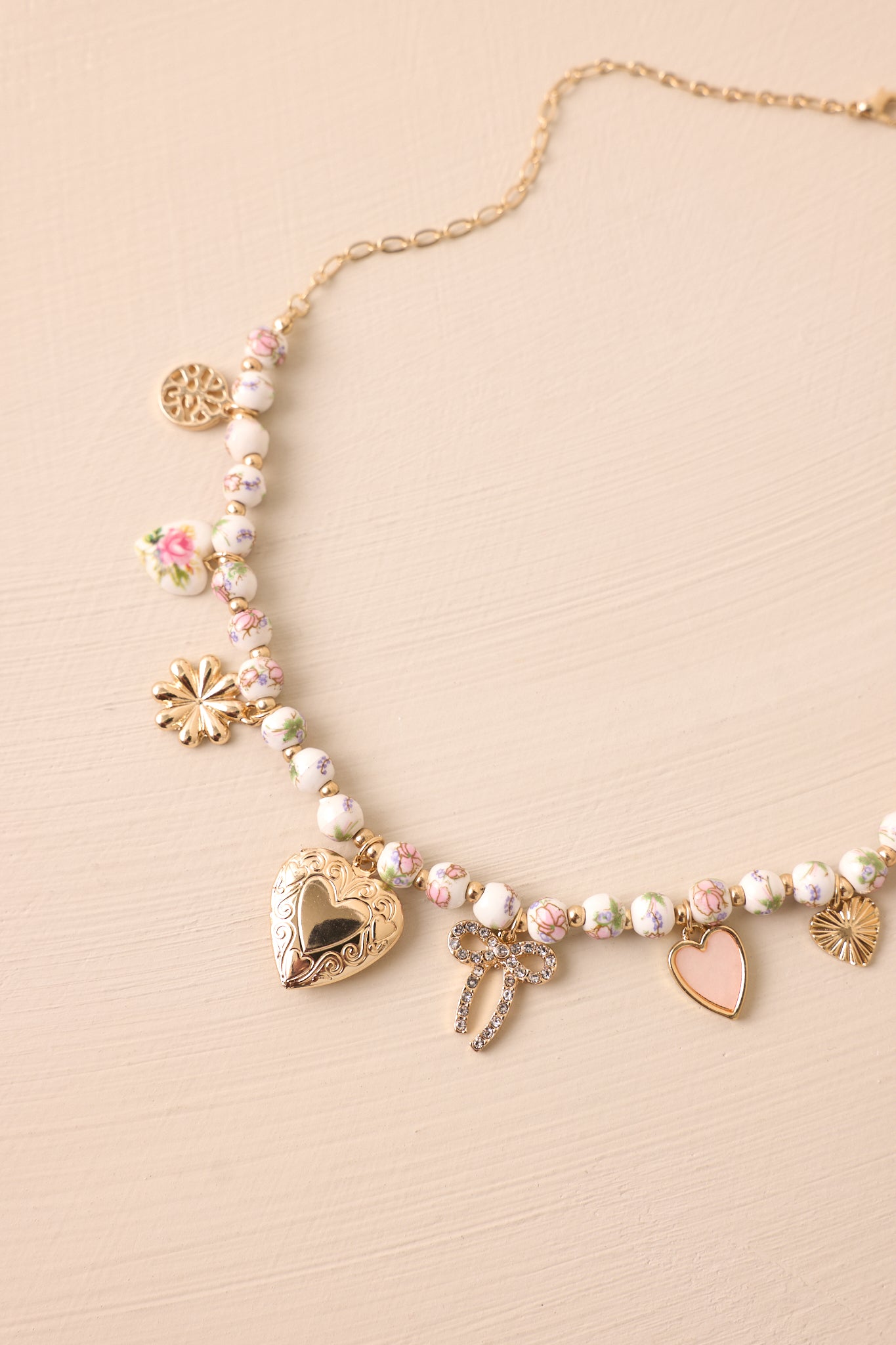 Walking on Air Ivory Beaded Charm Necklace