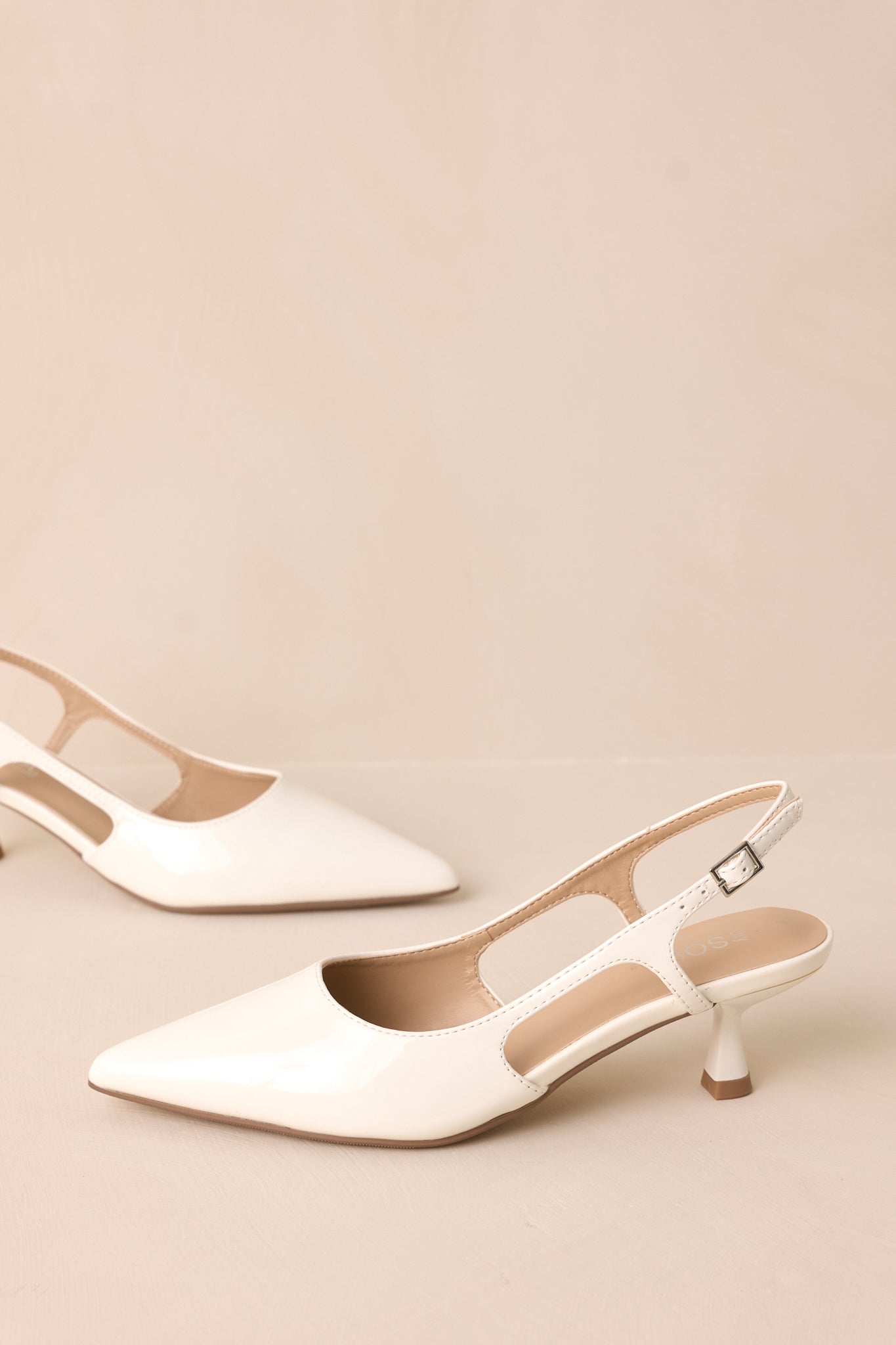 Fiercely Stunned White Patent Kitten Heels