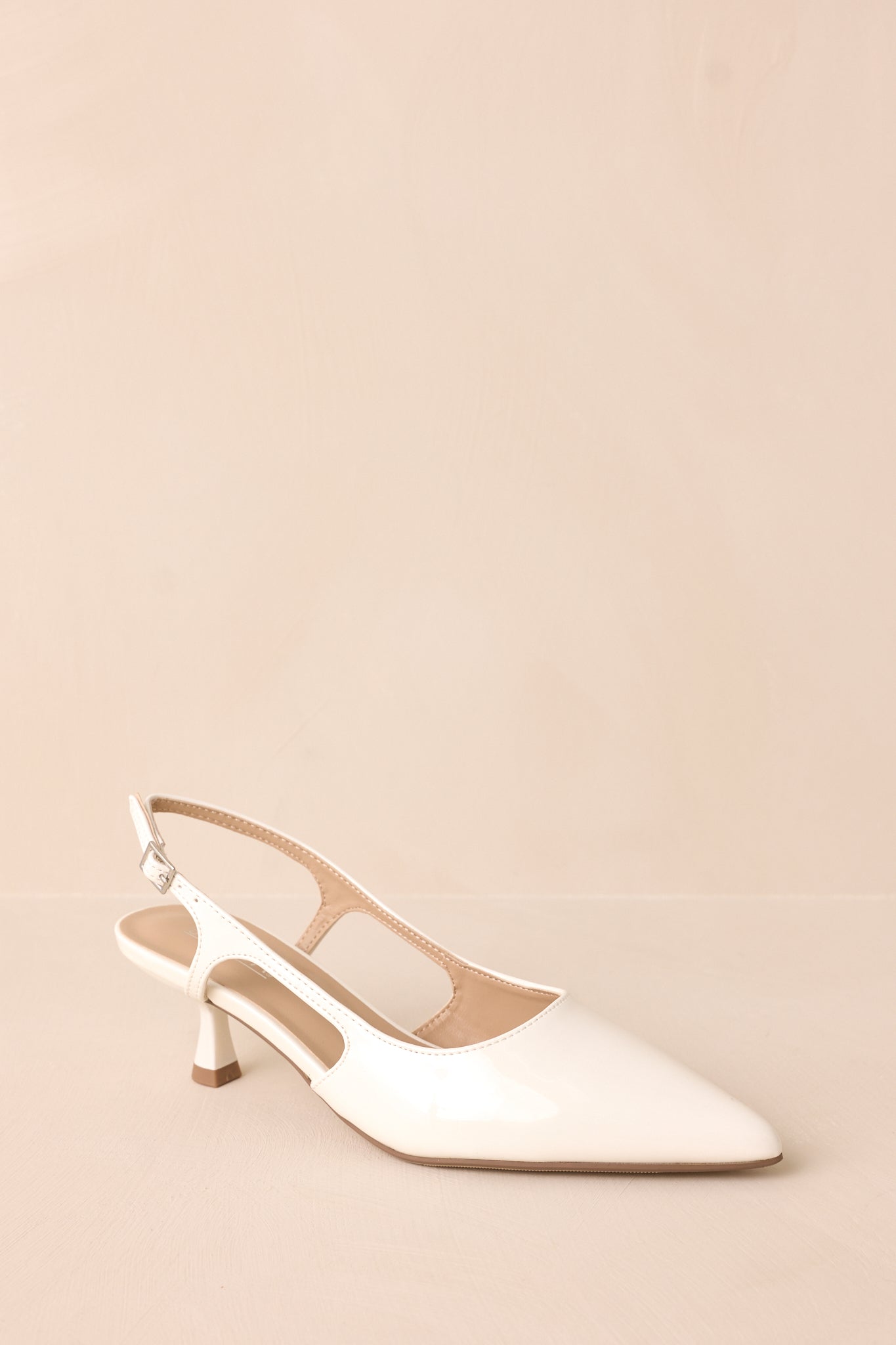 Fiercely Stunned White Patent Kitten Heels