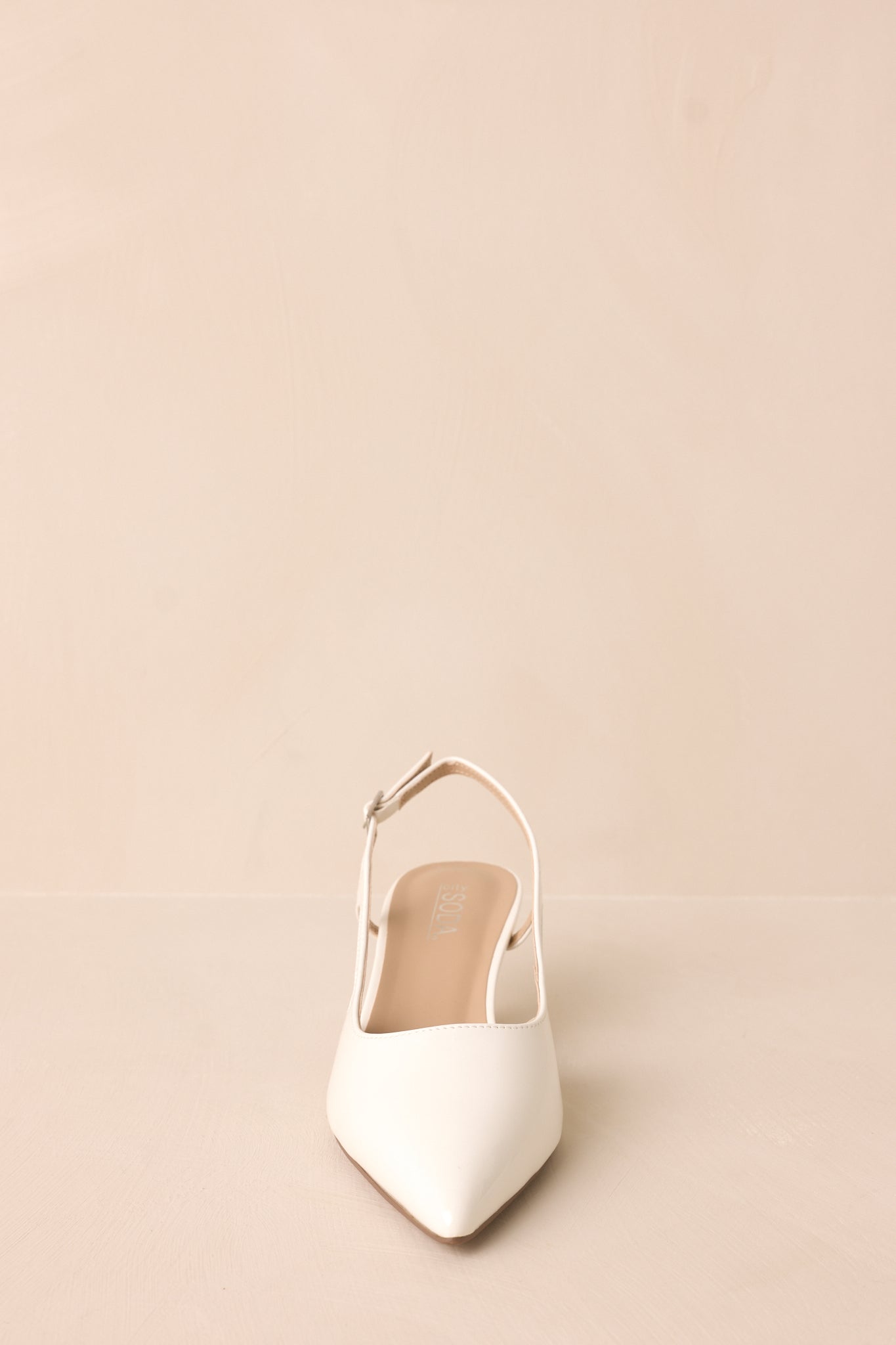 Fiercely Stunned White Patent Kitten Heels