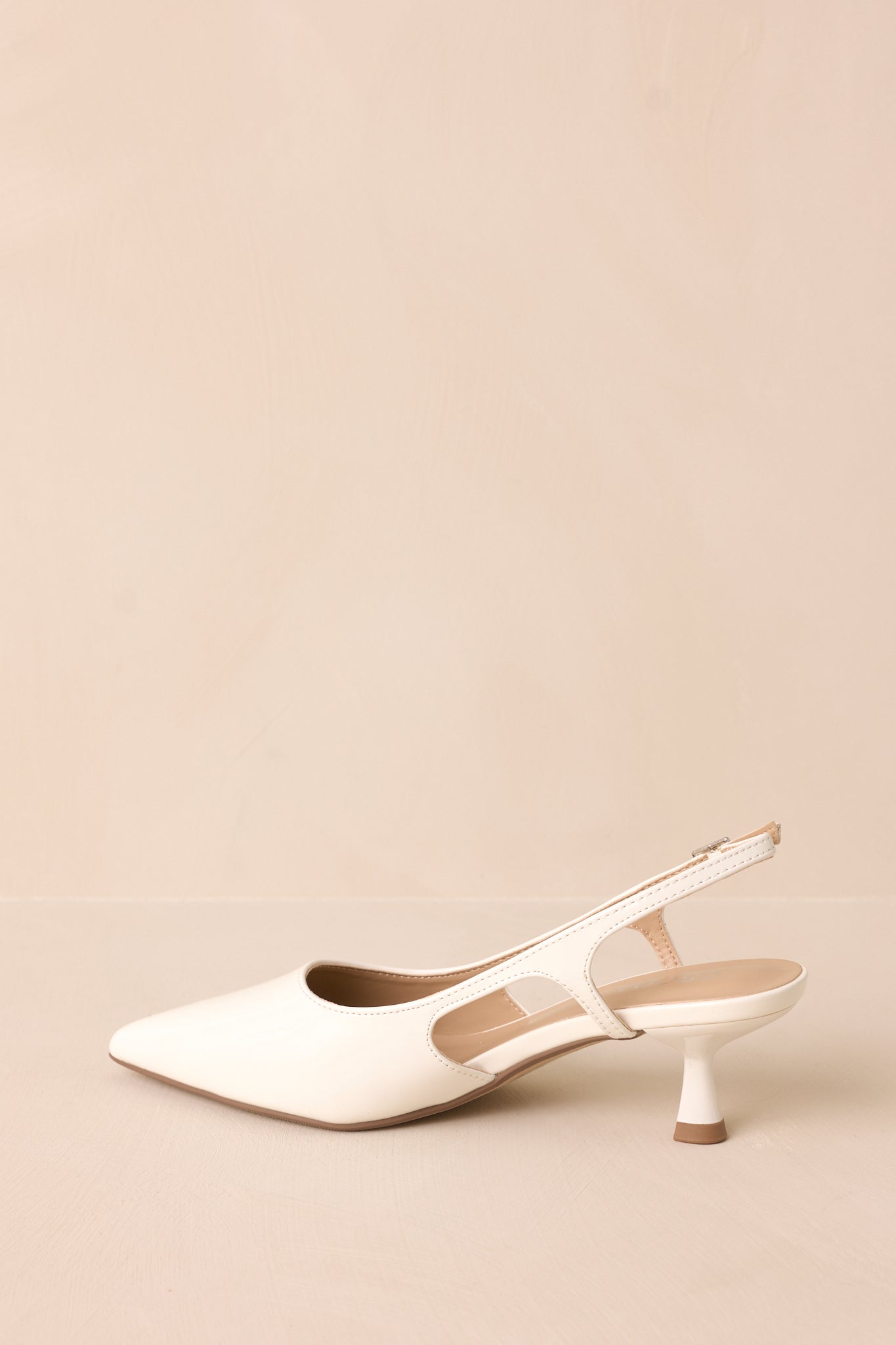 Fiercely Stunned White Patent Kitten Heels