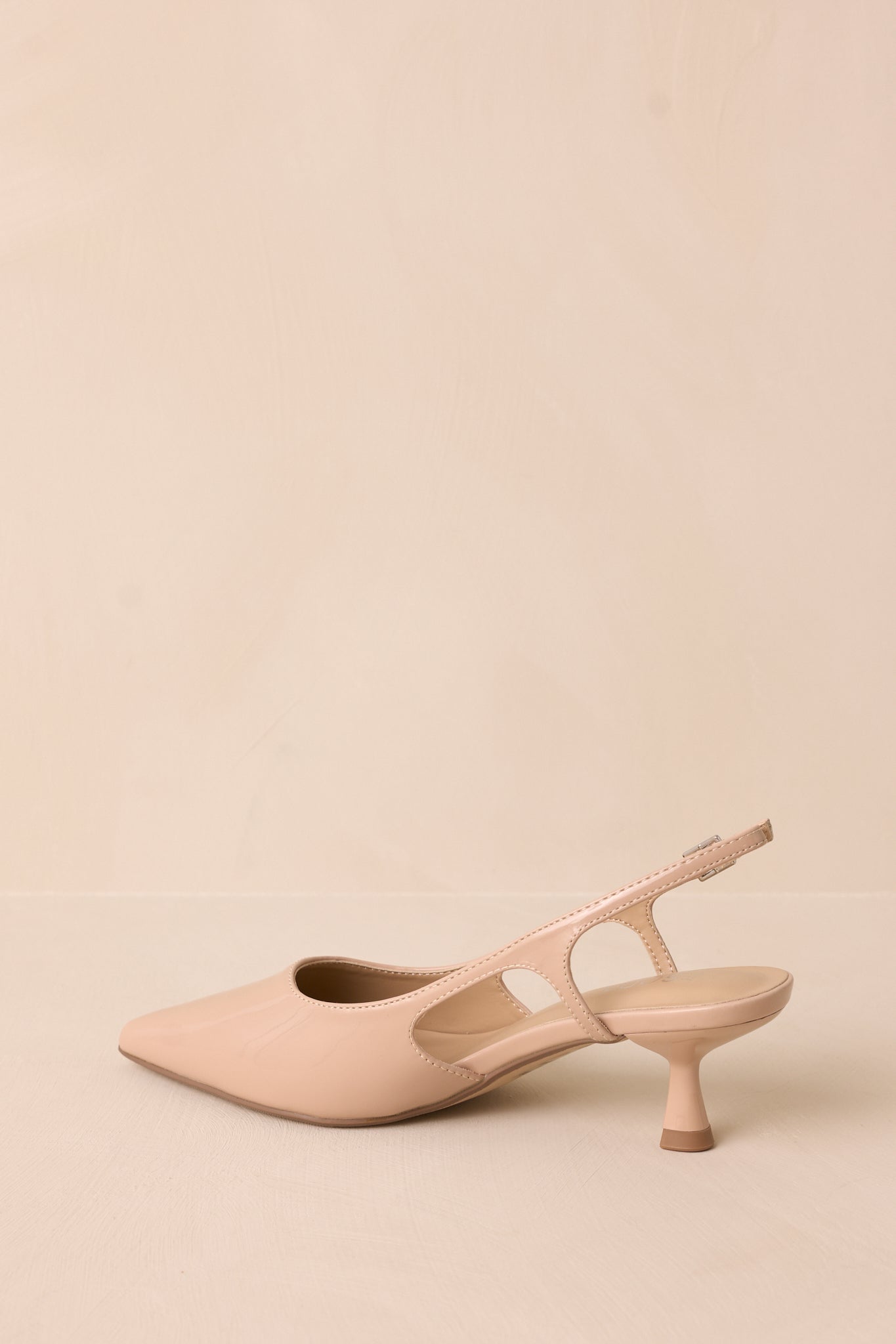 Fiercely Stunned Nude Patent Kitten Heels