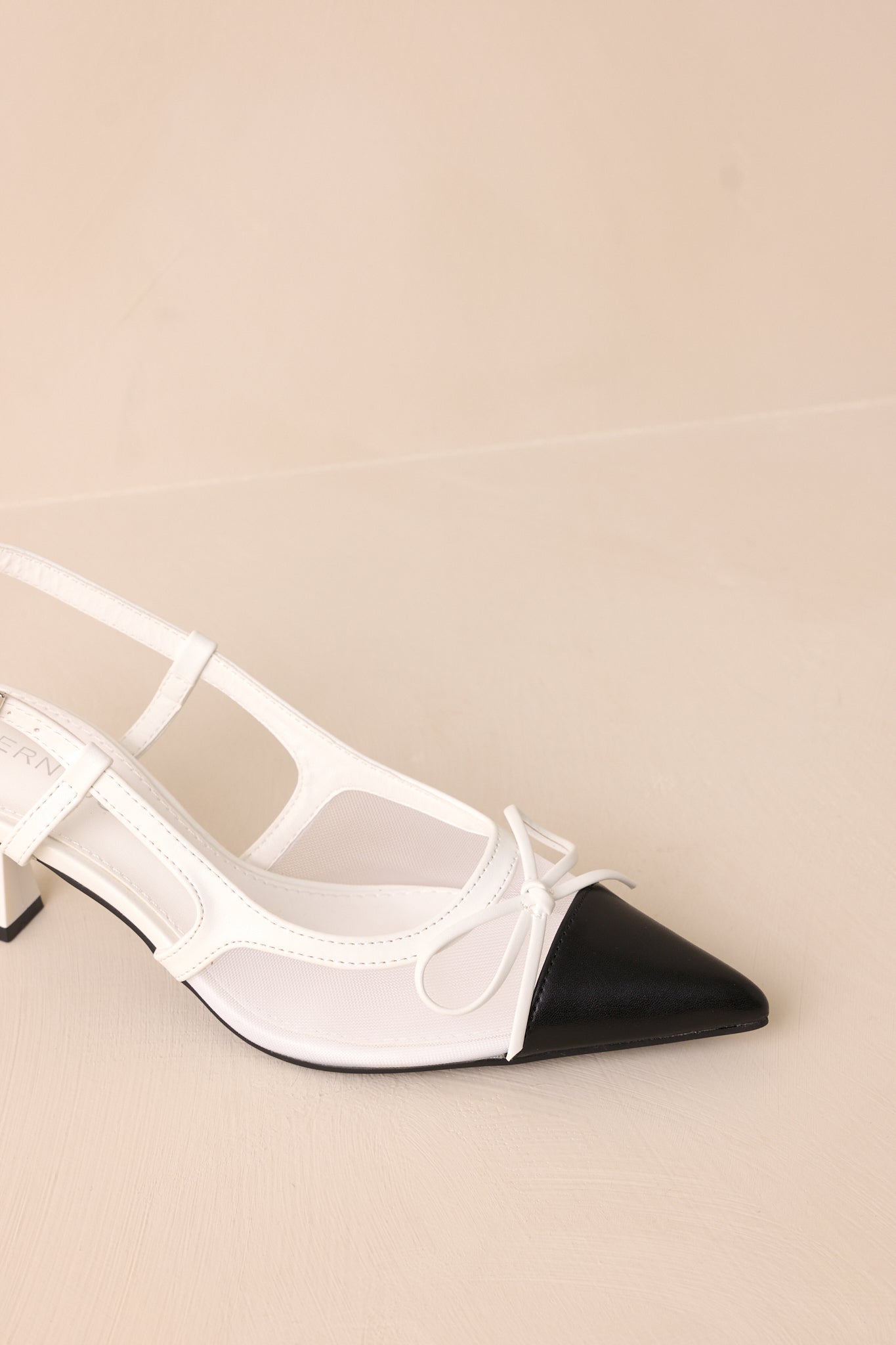 Step Stunner White And Black Kitten Heel