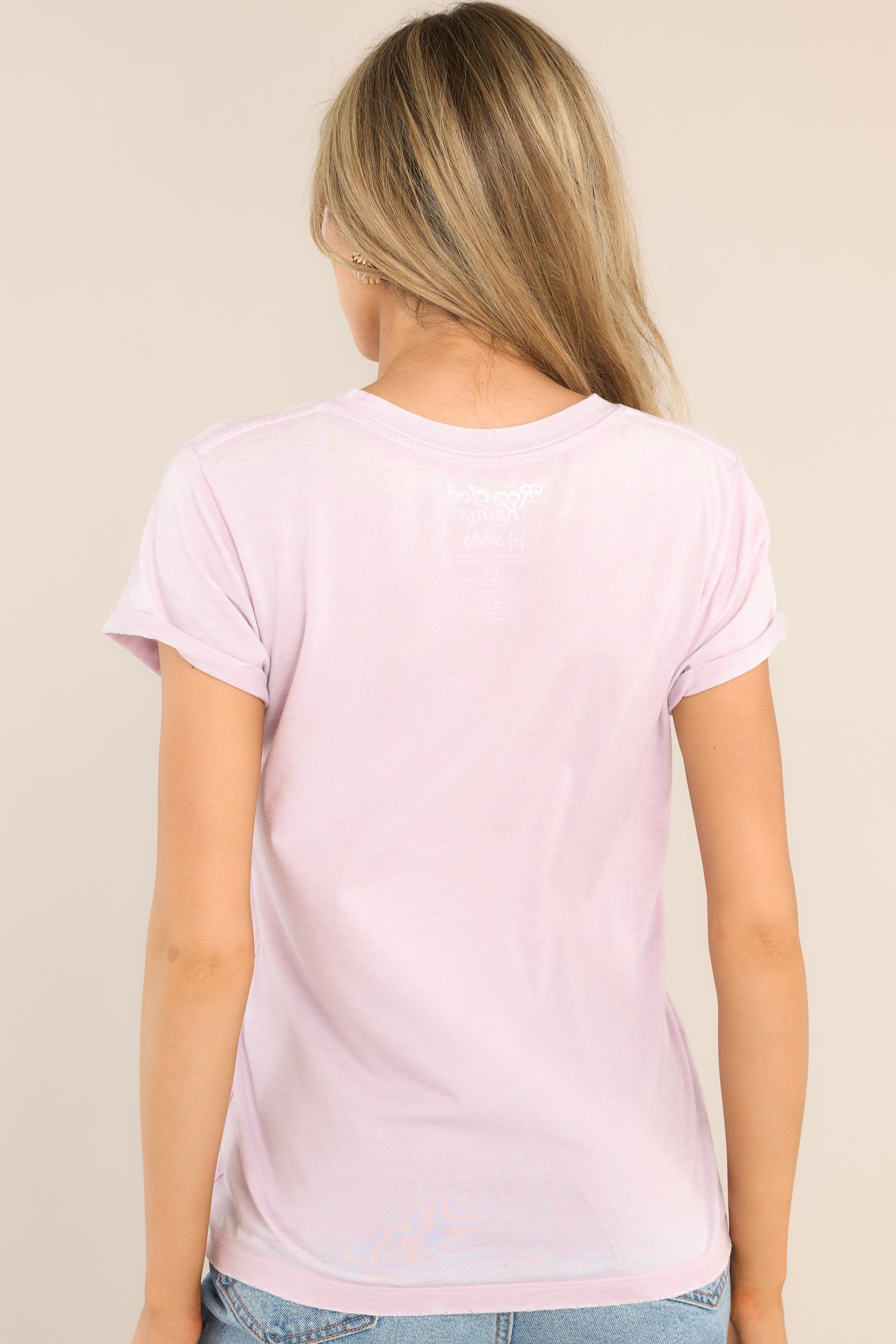 Back view of this top that features a crew neckline, a Def Leppard graphic, and short sleeves.