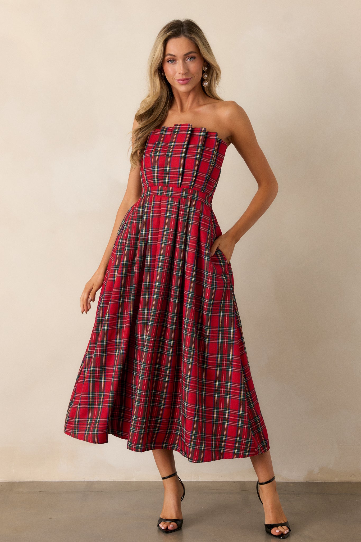 A full-length view from a front angle, emphasizing the dress's smocked back and how it enhances the fit, providing comfort and style.