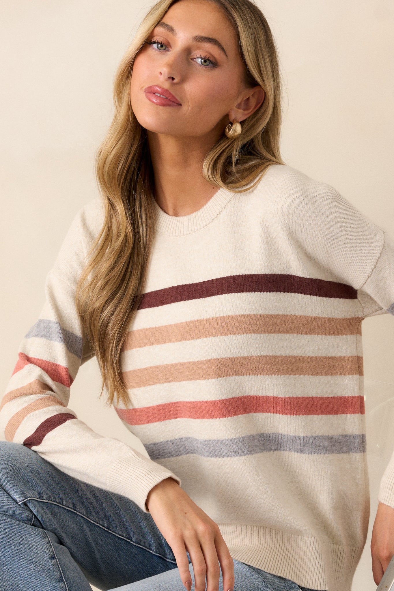 Side view close-up, focusing on the long sleeve and how the horizontal stripes continue across the arm.