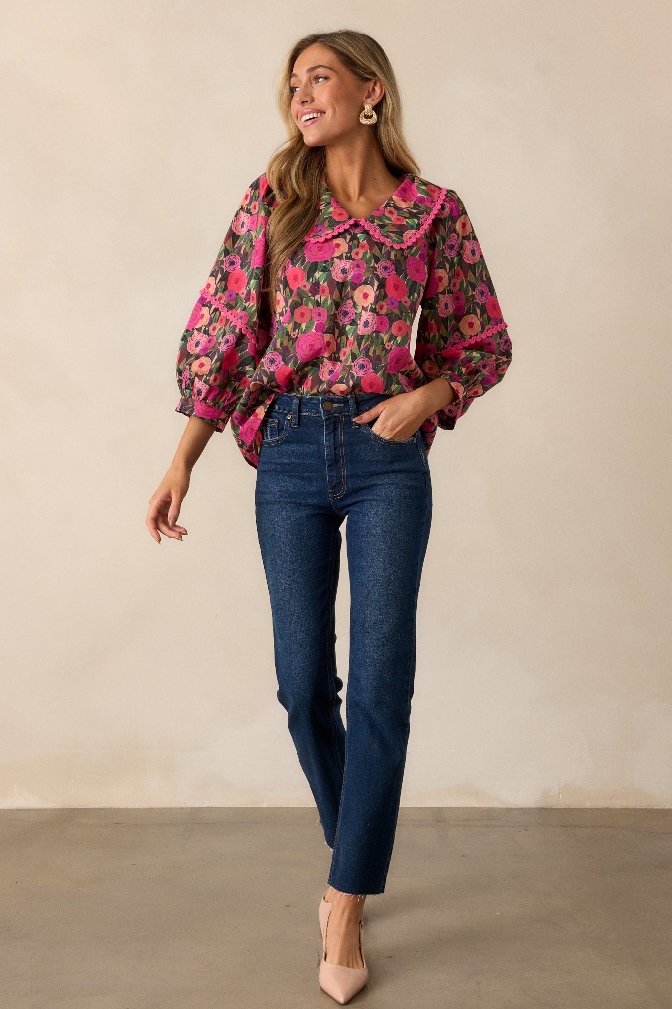 Full-body shot highlighting the pink blouse's 3/4 puff sleeves, peter pan collar, and delicate floral design.