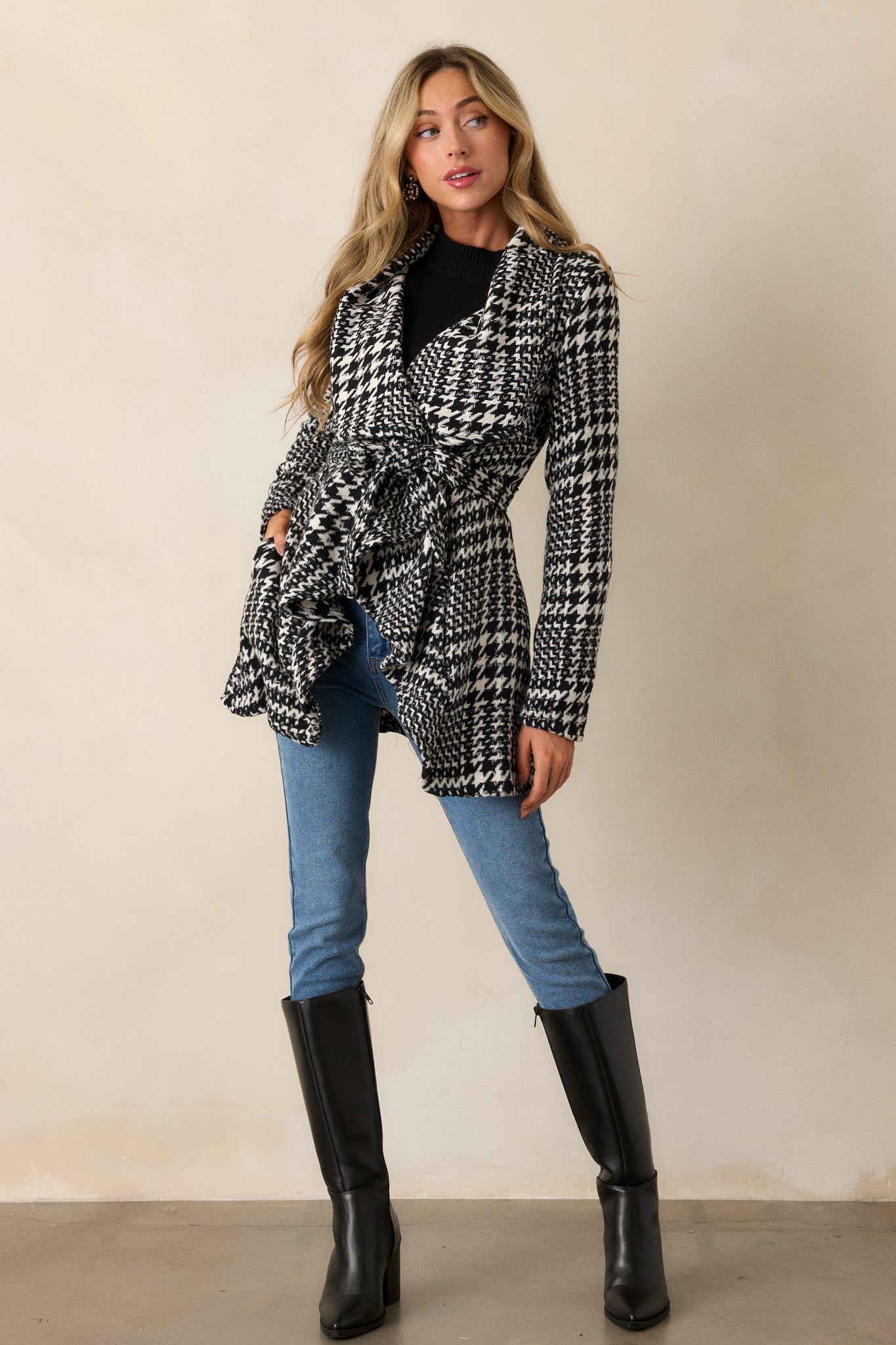 Full length view of the houndstooth pattern and the texture of the soft material.