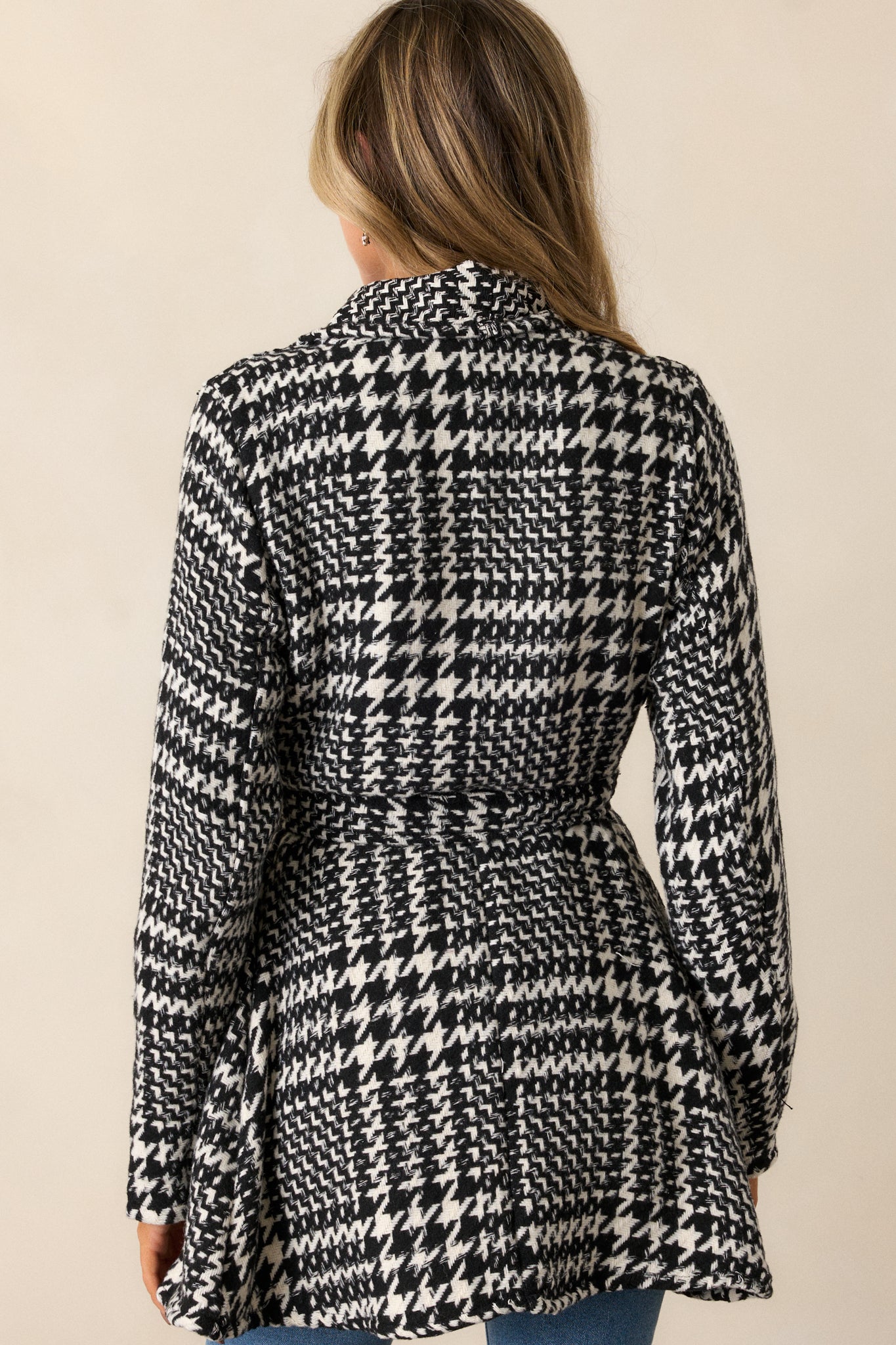 Back view highlighting the jacket's structure, collar, and the houndstooth design extending to the hemline.