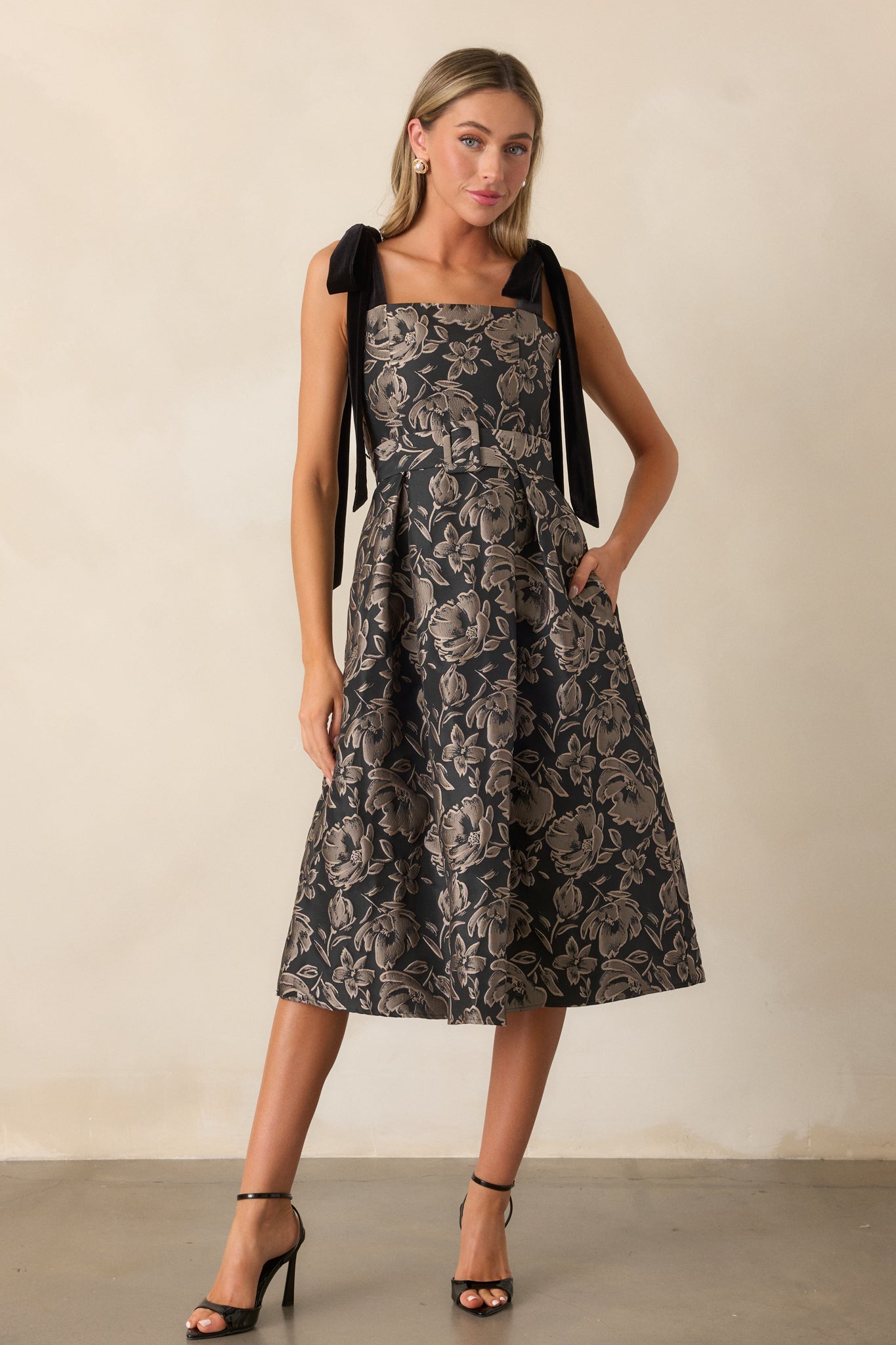 An angled front view highlighting the texture of the jacquard fabric and the flow of the dress.