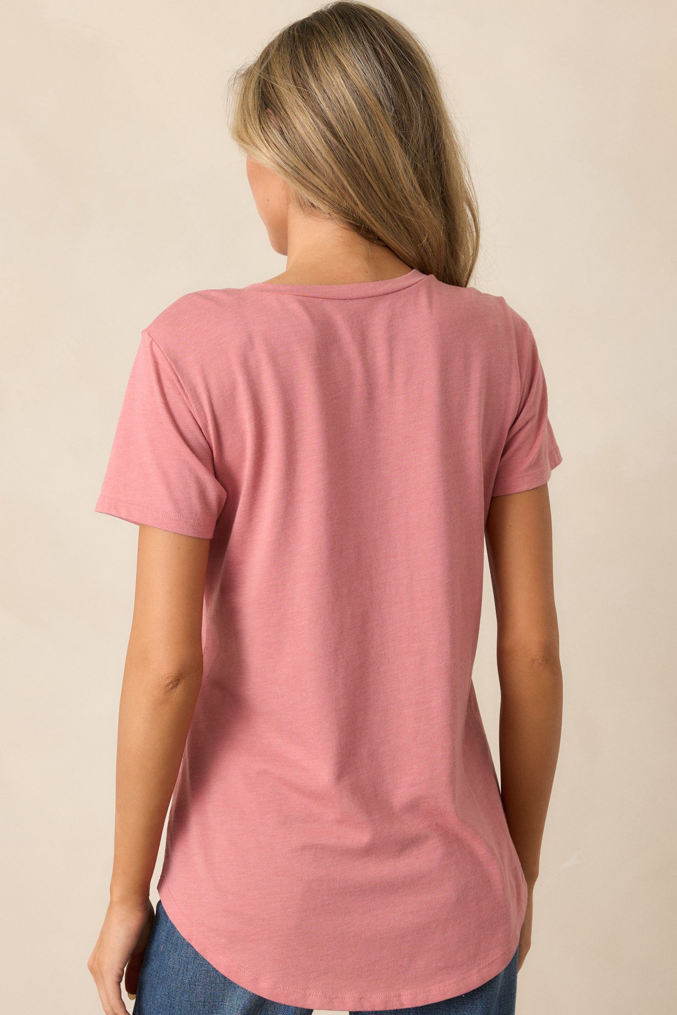 Back view of a rosebud tee highlighting the super soft fabric and scooped hemline.