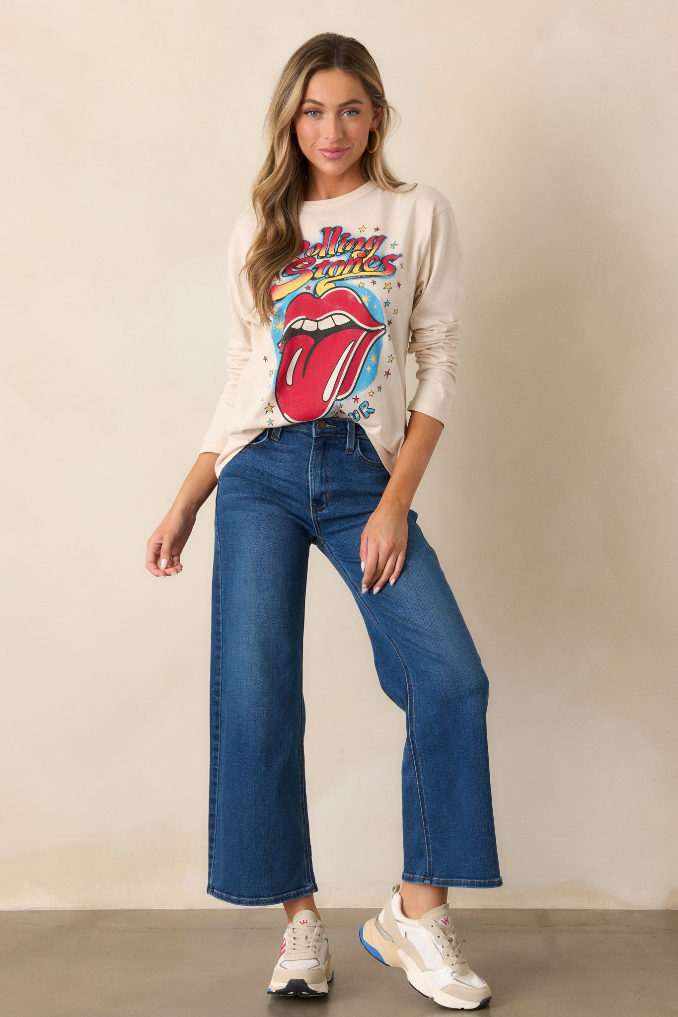 An ecru long sleeve tee with a round crew neckline and a relaxed fit, featuring the Rolling Stones 1972 Tour logo prominently on the front.