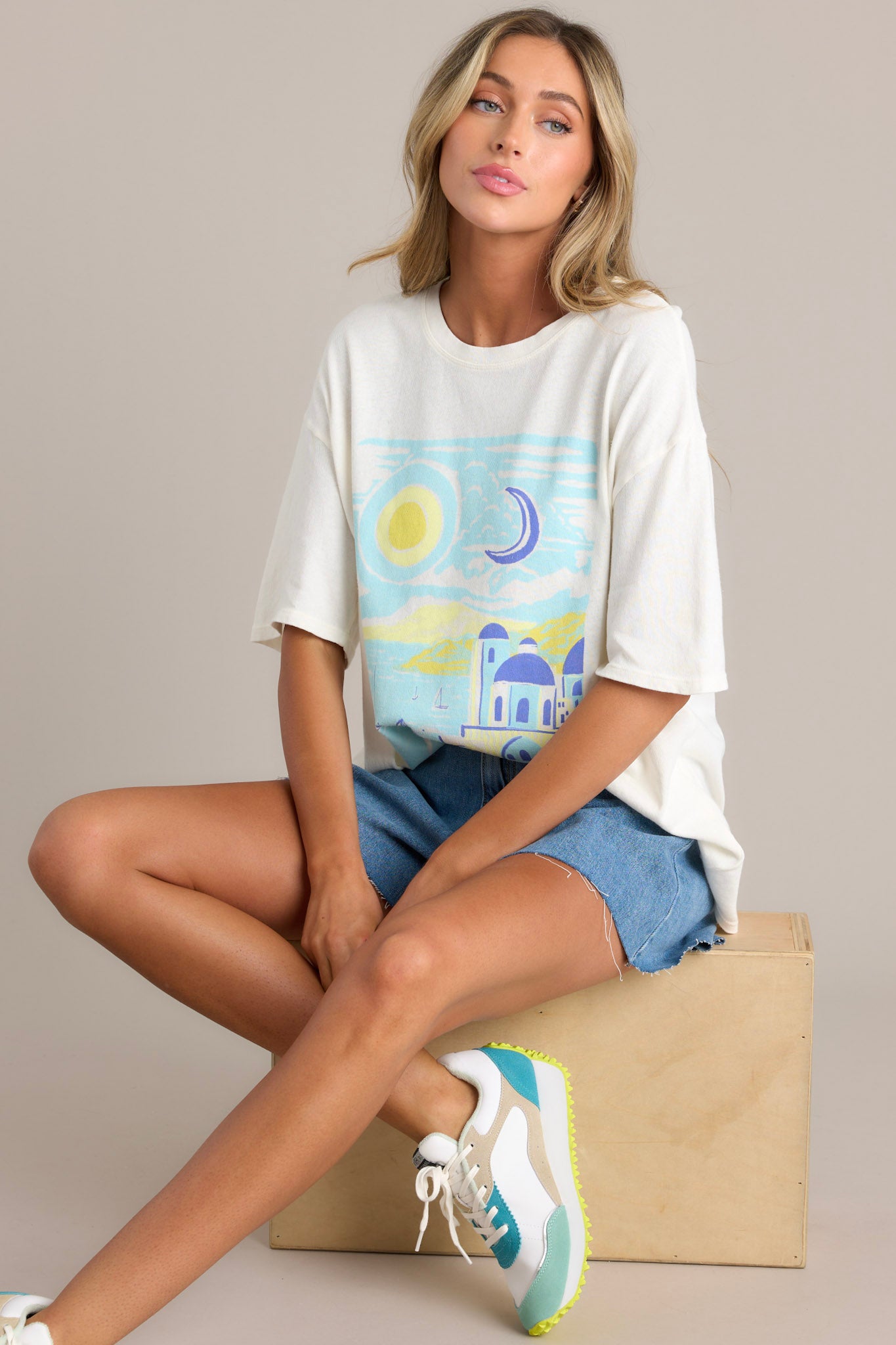 This tee features a crew neckline, a washed graphic, and a oversized fit.