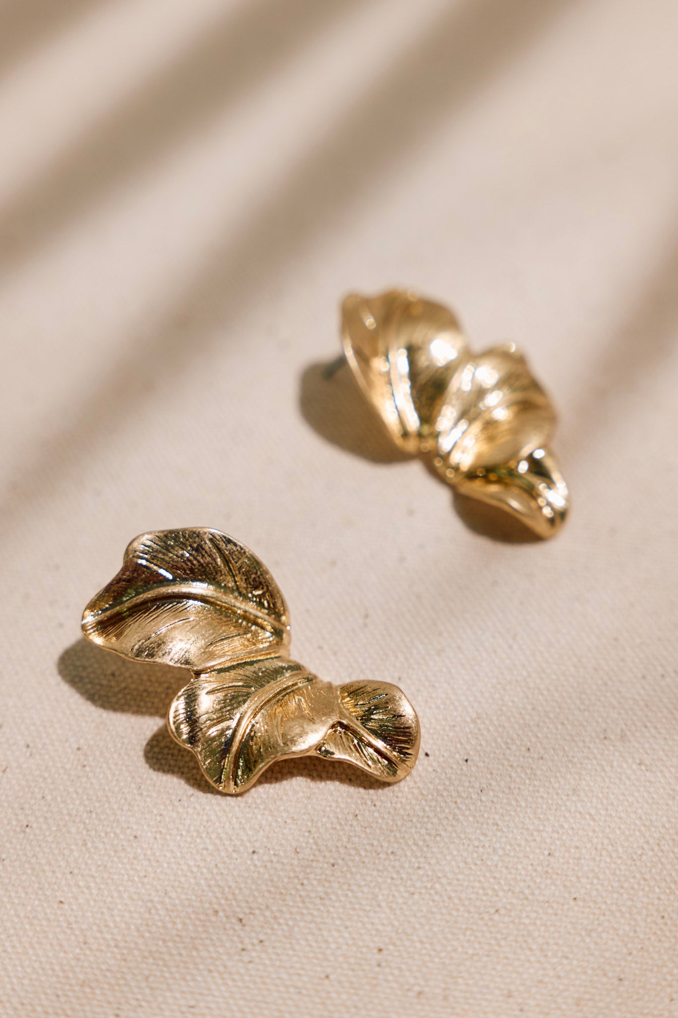 Tropical Enchantment Worn Gold Palm Leaf Earrings