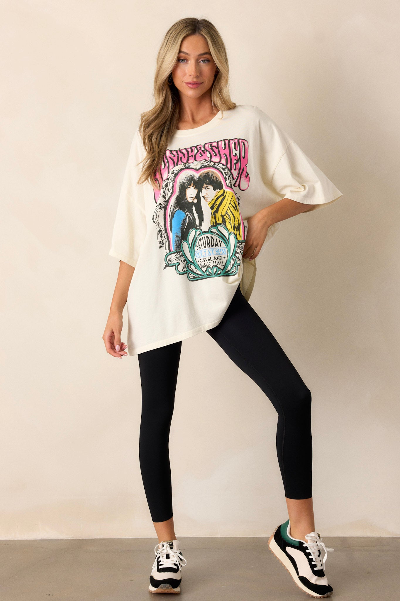 Oversized ivory tee with 'Sonny & Cher' concert graphic and Cleveland Public Hall show details, designed with a loose silhouette and short sleeves.