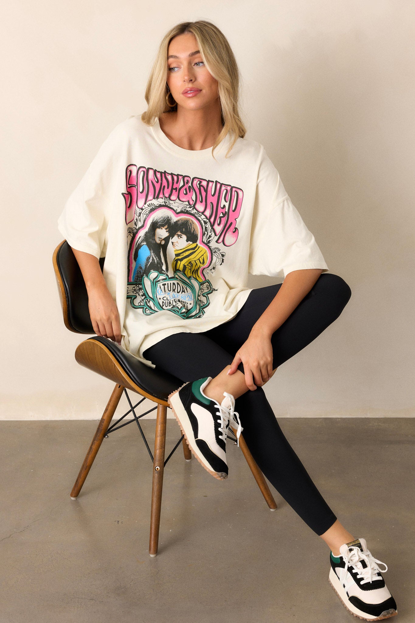 Ivory graphic tee with 'Sonny & Cher' concert print from their Cleveland Public Hall show, featuring a relaxed, oversized fit and short sleeves.