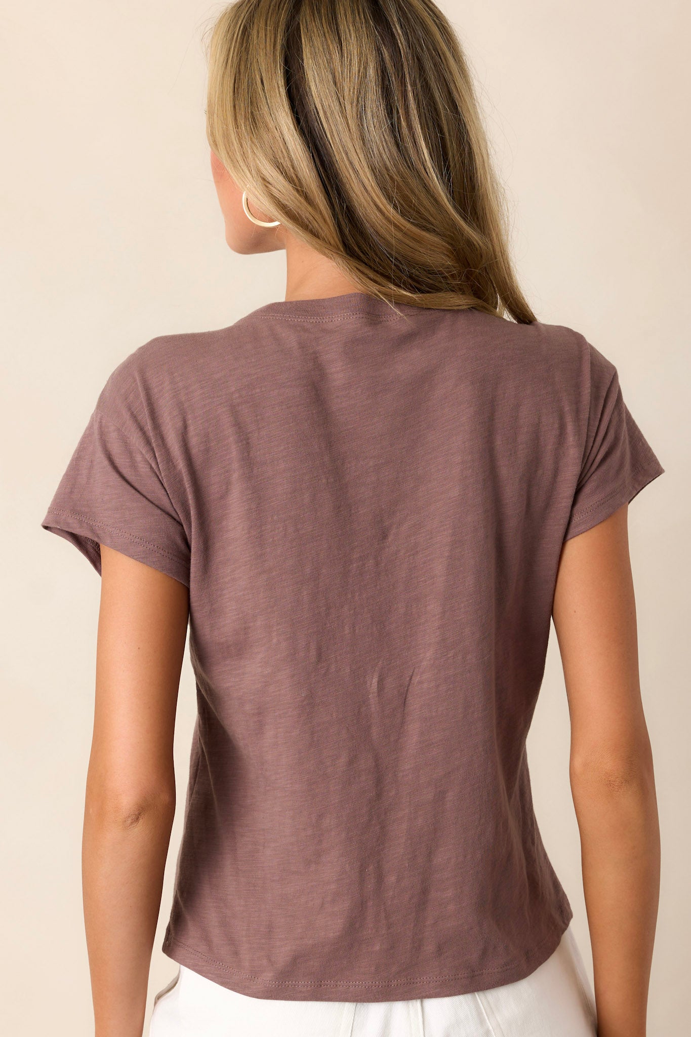 Back view of the taupe tee highlighting the crew neckline and the smooth, lightweight jersey material.