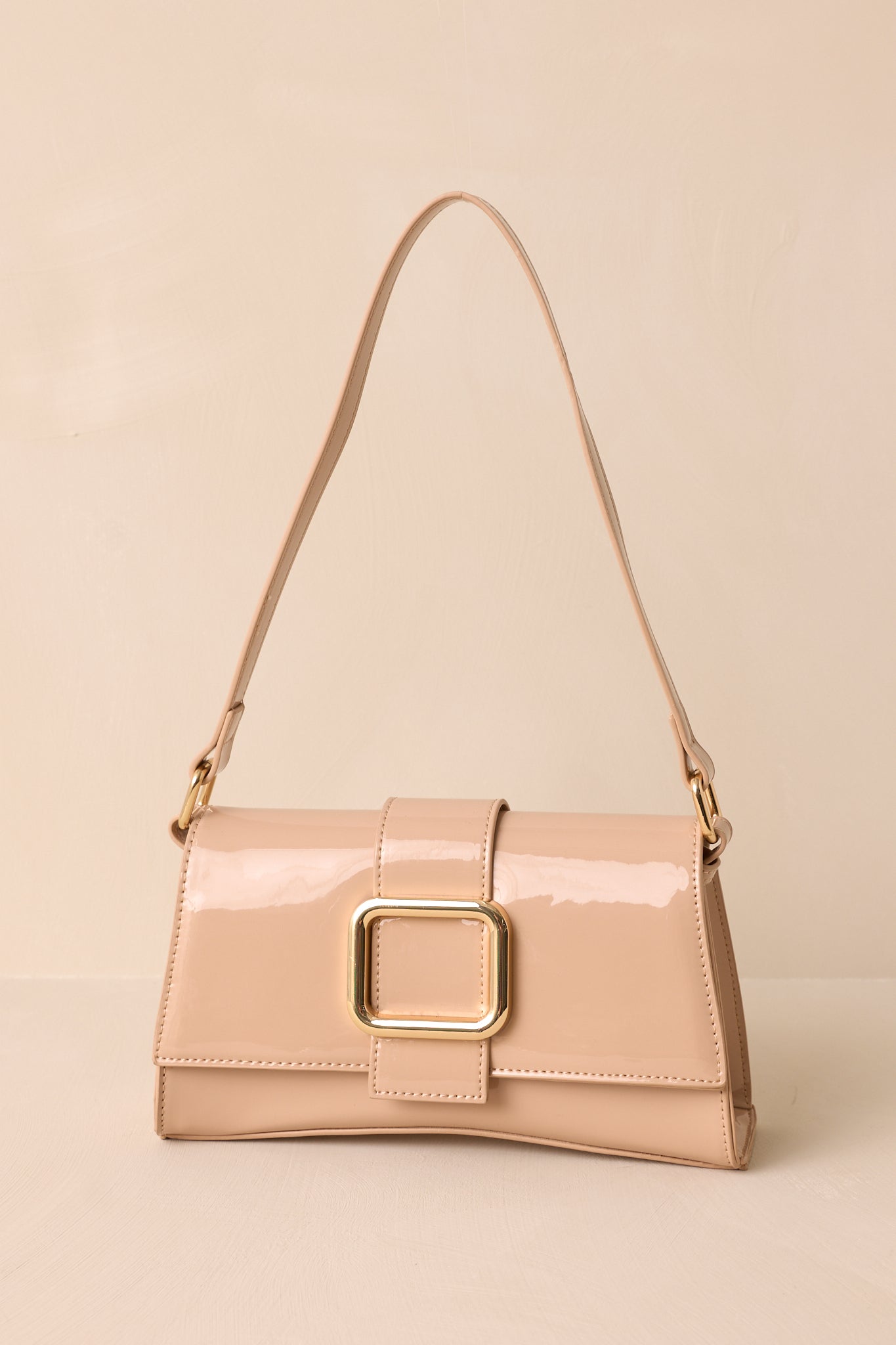 Elegant Allure Beige Glossy Handbag