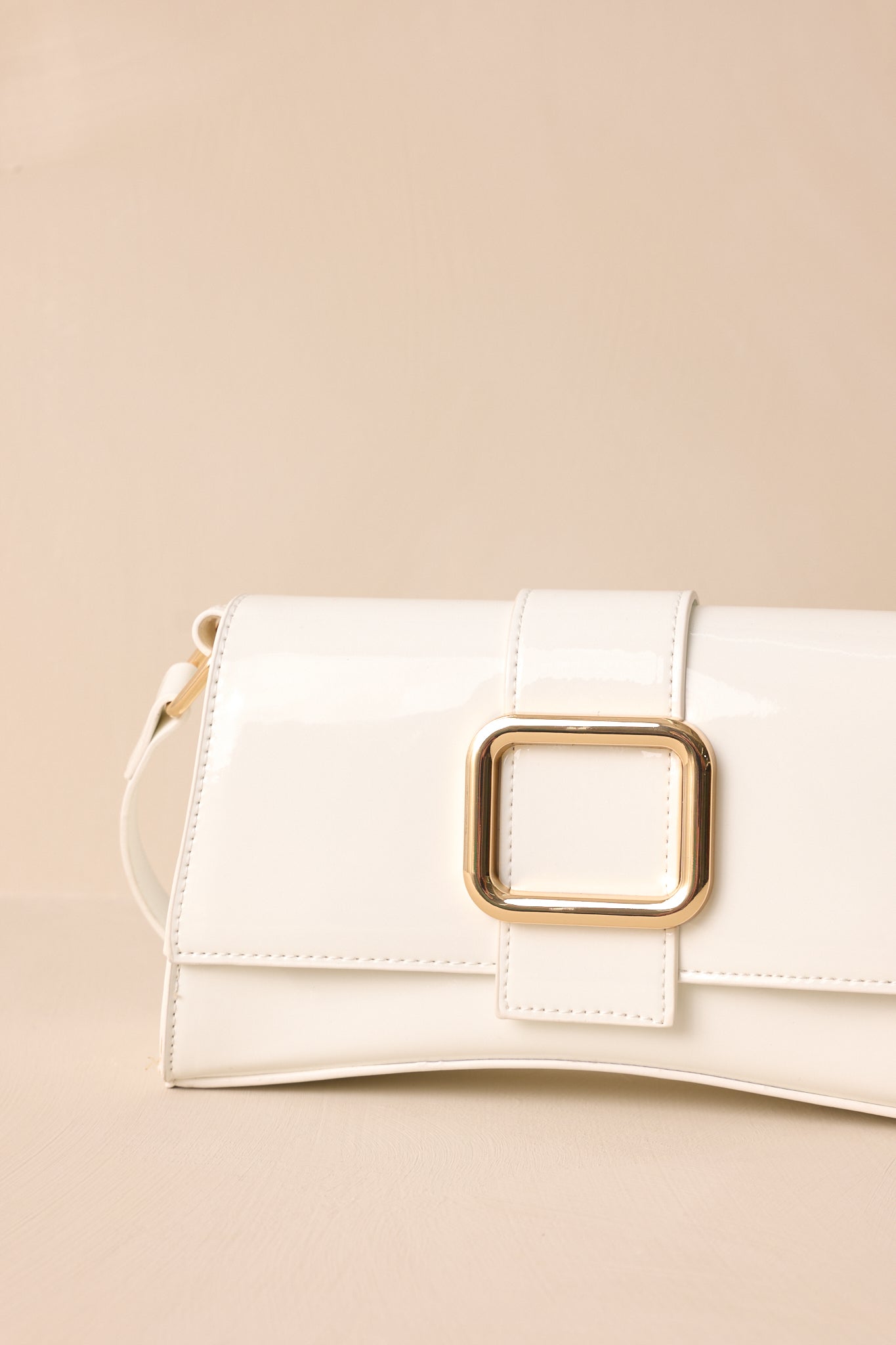 Elegant Allure Ivory Glossy Handbag