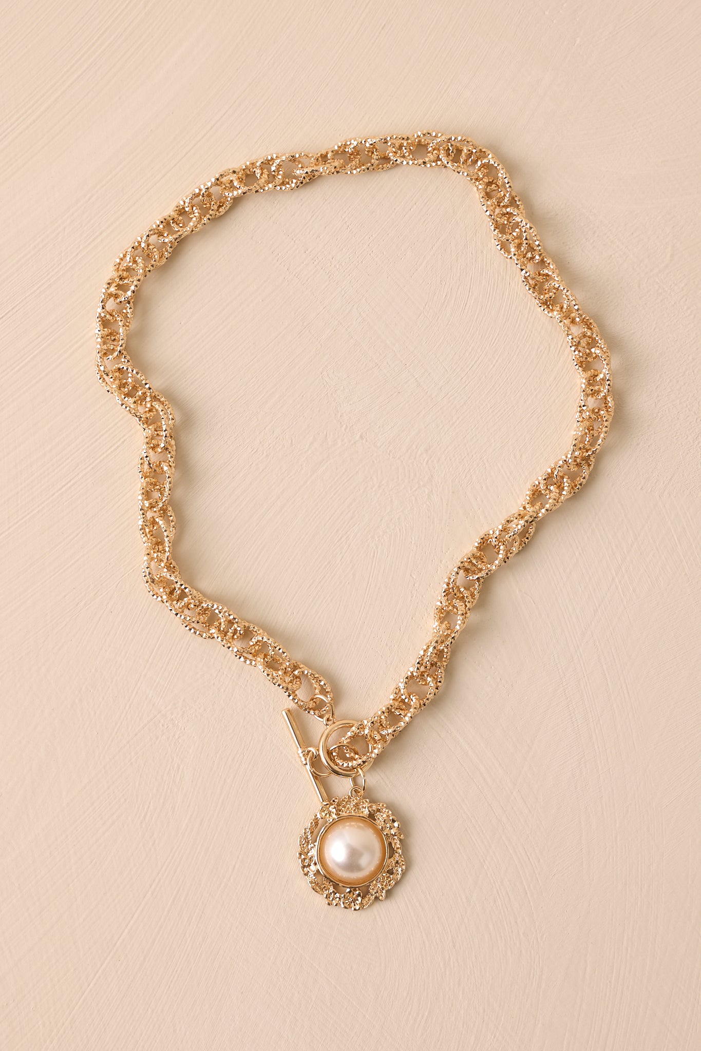 The World At Large Gold Chain Pearl Necklace