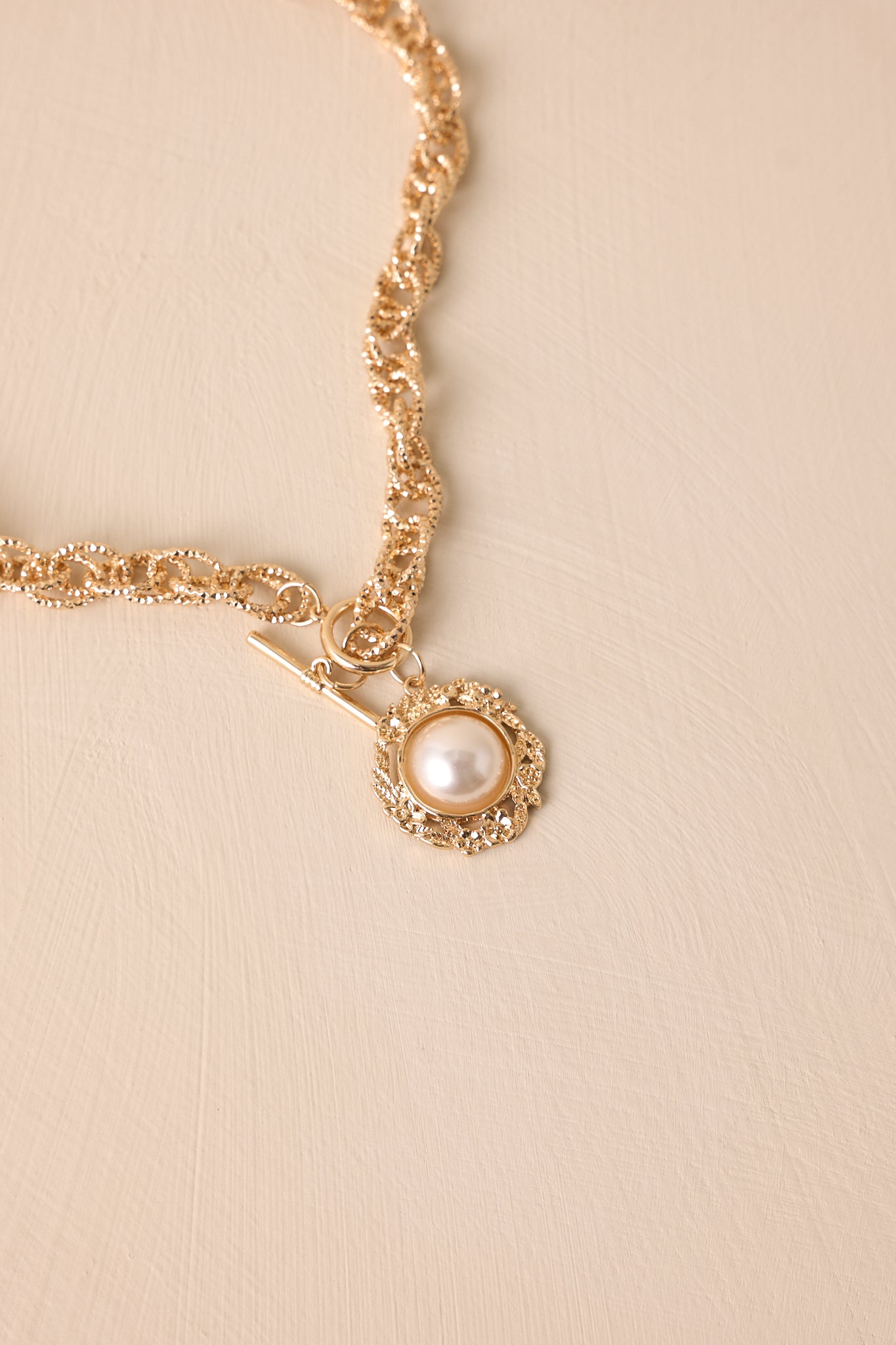 The World At Large Gold Chain Pearl Necklace